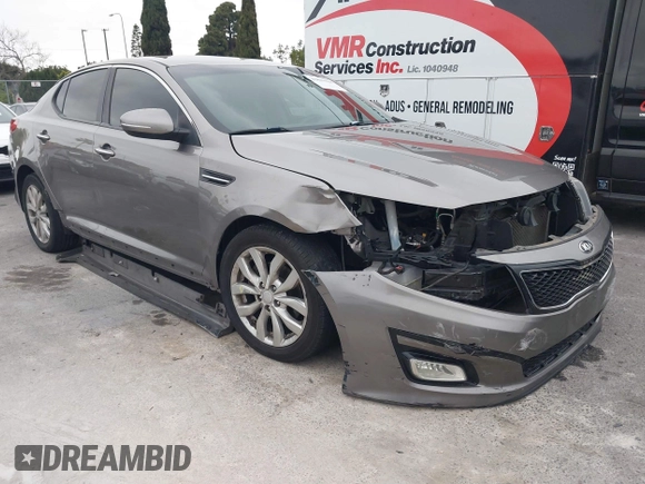 2015 Kia Optima LX with VIN 5XXGM4A75FG507392, listed as a IAAI auction lot 41889228 with 133,460 mi miles. Bid and sale history available at carsss.com. Image 1.