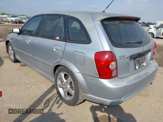 2003 Mazda Protege with VIN JM1BJ245031218333, listed as a IAAI auction lot 42070471 with 181,748 mi miles and . Bid and sale history available at DreamBid. Image 3.