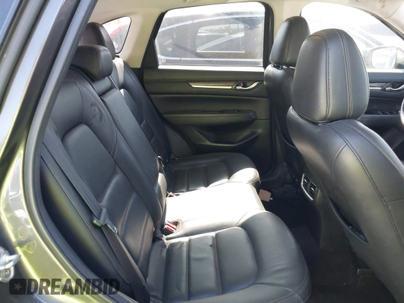 2020 Mazda CX-5 Grand Touring with VIN JM3KFADM3L1812649, listed as a IAAI auction lot 42575393 with 102,118 mi miles and . Bid and sale history available at DreamBid. Image 8.