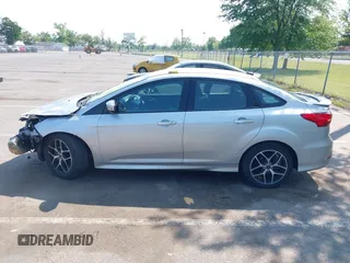 2015 Ford Focus SE with VIN 1FADP3F25FL381008, listed as a IAAI auction lot 42413322 with 106,353 mi miles and . Bid and sale history available at DreamBid. Image 14.