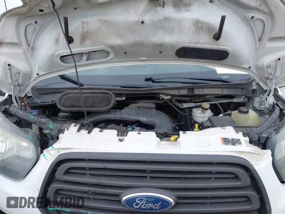 2016 Ford Transit Cargo with VIN 1FTYE1ZM6GKA95971, listed as a IAAI auction lot 42412181 with 243,171 mi miles and . Bid and sale history available at DreamBid. Image 10.