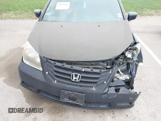 2009 Honda Odyssey EX-L with VIN 5FNRL38769B409281, listed as a IAAI auction lot 42013137 with 213,934 mi miles and . Bid and sale history available at DreamBid. Image 6.