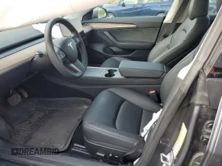 2023 Tesla Model 3 with VIN 5YJ3E1EA8PF692428, listed as a Copart auction lot 64667414 with 16,704 mi miles and Salvage Title. Bid and sale history available at DreamBid. Image 7.