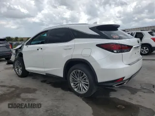 2021 Lexus RX 350 with VIN 2T2JZMDA5MC299559, listed as a Copart auction lot 60450495 with 24,390 mi miles and Salvage title. Bid and sale history available at DreamBid. Image 2.
