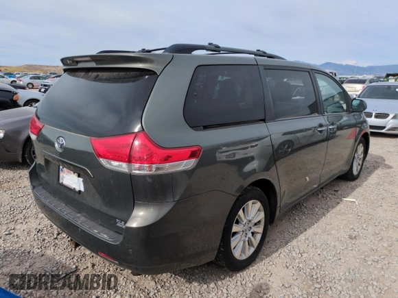 2013 Toyota Sienna XLE with VIN 5TDDK3DC1DS063127, listed as a Copart auction lot 58387015 with 196,574 mi miles and Salvage title. Bid and sale history available at DreamBid. Image 3.