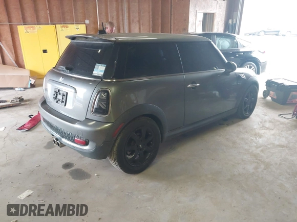 2009 MINI Hardtop S with VIN WMWMF73539TT98930, listed as a IAAI auction lot 42439606 with 152,954 mi miles and . Bid and sale history available at DreamBid. Image 4.
