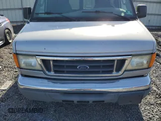 2005 Ford Econoline Passenger XL with VIN 1FBNE31LX5HA76002, listed as a Copart auction lot 43599865 with 198,749 mi miles and Salvage Title. Bid and sale history available at carsss.com. Image 12.