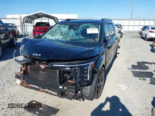 2025 Kia Carnival SX with VIN KNDNE5K35S6472142, listed as a IAAI auction lot 41280650 with 4,181 mi miles and . Bid and sale history available at DreamBid. Image 6.