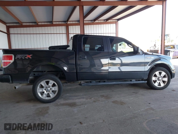 2014 Ford F-150 XL with VIN 1FTFW1CF9EKF87745, listed as a IAAI auction lot 42026883 with 221,307 mi miles. Bid and sale history available at carsss.com. Image 14.