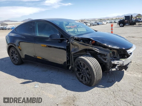 2024 Tesla Model Y Long Range z VIN 7SAYGAEE3RF089122, wystawiony jako Copart lot #52732035 z przebiegiem 15 486 mil mil oraz Szkoda całkowita • Salvage title. Historia ofert i sprzedaży dostępna na DreamBid. Obrazek 4.