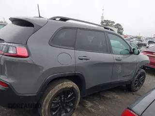 2023 Jeep Cherokee Altitude Lux with VIN 1C4PJMMB8PD114958, listed as a IAAI auction lot 41862302 with 64,341 mi miles. Bid and sale history available at carsss.com. Image 13.