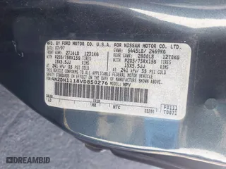 1997 Nissan Quest XE with VIN 4N2DN1118VD850276, listed as a IAAI auction lot 41403441 with 207,530 mi miles. Bid and sale history available at carsss.com. Image 9.