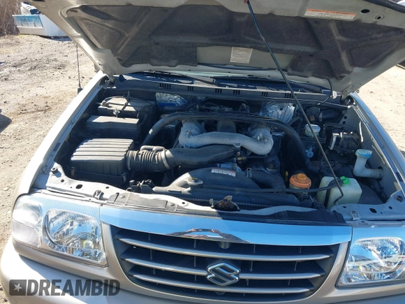 2005 Suzuki Grand Vitara LX with VIN JS3TD62V454200331, listed as a IAAI auction lot 41896812 with 122,974 mi miles and . Bid and sale history available at DreamBid. Image 10.