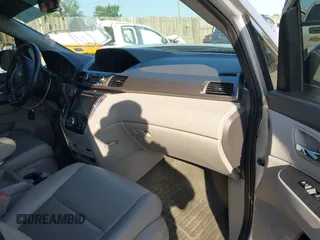 2014 Honda Odyssey Touring with VIN 5FNRL5H95EB108427, listed as a IAAI auction lot 39992643 with 100,658 mi miles and . Bid and sale history available at DreamBid. Image 5.