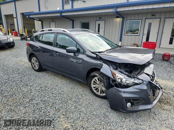 2018 Subaru Impreza Premium with VIN 4S3GTAD64J3715454, listed as a Copart auction lot 64798345 with 63,467 mi miles and Salvage title. Bid and sale history available at DreamBid. Image 4.
