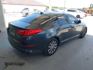 2015 Kia Optima EX z VIN 5XXGN4A7XFG497858, wystawiony jako IAAI lot #42156724 z przebiegiem 109 028 mil mil oraz . Historia ofert i sprzedaży dostępna na DreamBid. Obrazek 4.