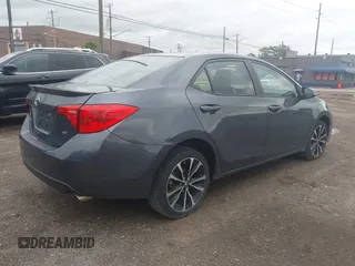 2017 Toyota Corolla L z VIN 5YFBURHE7HP633484, wystawiony jako IAAI lot #42538243 z przebiegiem 80 492 mil mil oraz . Historia ofert i sprzedaży dostępna na DreamBid. Obrazek 4.