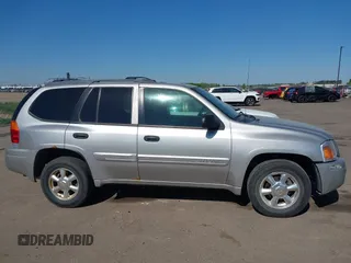2004 GMC Envoy SLT z VIN 1GKDT13S642449872, wystawiony jako IAAI lot #42236157 z przebiegiem 205 194 mil mil oraz . Historia ofert i sprzedaży dostępna na DreamBid. Obrazek 14.