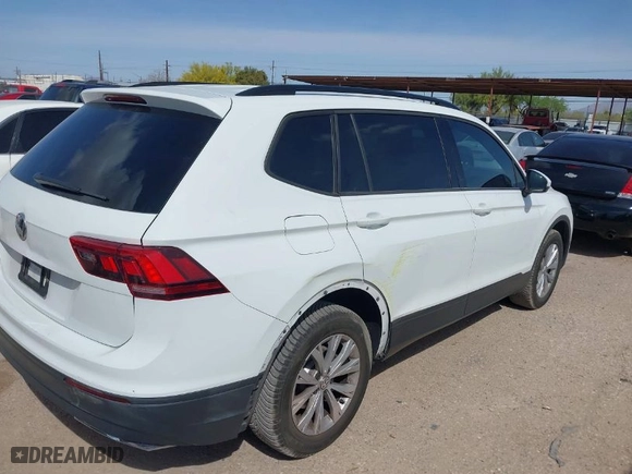 2019 Volkswagen Tiguan S with VIN 3VV1B7AXXKM056760, listed as a IAAI auction lot 41907533 with 46,749 mi miles. Bid and sale history available at carsss.com. Image 4.