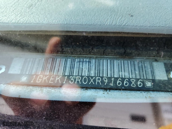 1999 GMC Denali with VIN 1GKEK13R0XR916686, listed as a Copart auction lot 61120914 with 240,605 mi miles and Salvage Title. Bid and sale history available at carsss.com. Image 13.