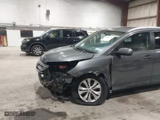 2014 Honda CR-V EX-L with VIN 2HKRM4H75EH680833, listed as a IAAI auction lot 41950235 with 178,929 mi miles. Bid and sale history available at carsss.com. Image 6.