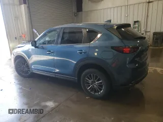 2020 Mazda CX-5 Touring with VIN JM3KFBCM2L0853447, listed as a Copart auction lot 54621675 with 88,649 mi miles and Non Repairable. Bid and sale history available at carsss.com. Image 2.