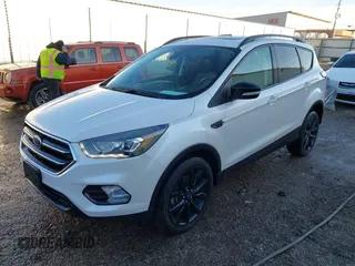2017 Ford Escape Titanium with VIN 1FMCU9J93HUE96611, listed as a IAAI auction lot 41546906 with 90,586 mi miles. Bid and sale history available at carsss.com. Image 17.