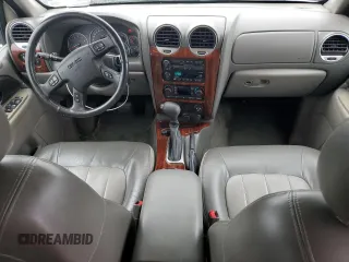 2004 GMC Envoy SLT with VIN 1GKDT13SX42404837, listed as a Copart auction lot 84515994 with 184,153 mi miles and Salvage Title. Bid and sale history available at carsss.com. Image 8.