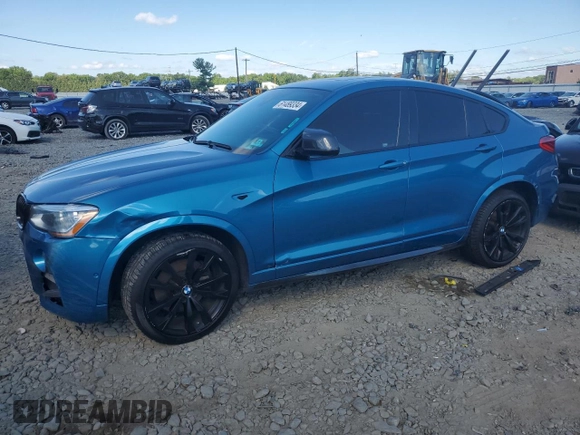 2017 BMW X4 M40i with VIN 5UXXW7C58H0U25599, listed as a Copart auction lot 61489334 with 115,001 mi miles and Salvage Title. Bid and sale history available at carsss.com. Image 1.