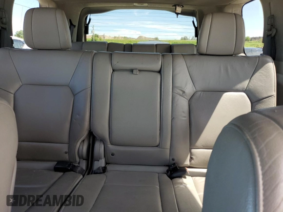2013 Honda Pilot EX-L z VIN 5FNYF3H57DB007540, wystawiony jako Copart lot #60630415 z przebiegiem 114 452 mil mil oraz Szkoda całkowita • Salvage title. Historia ofert i sprzedaży dostępna na DreamBid. Obrazek 10.