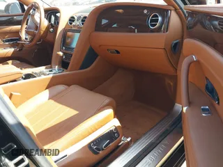 2015 Bentley Flying Spur V8 with VIN SCBET9ZA3FC042007, listed as a IAAI auction lot 40551620 with 27,039 mi miles and . Bid and sale history available at DreamBid. Image 5.