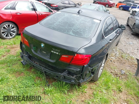 2012 BMW 5 Series 528i with VIN WBAXG5C5XCDX01864, listed as a IAAI auction lot 41910337 with 200,110 mi miles. Bid and sale history available at carsss.com. Image 4.