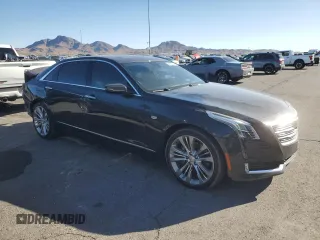 2016 Cadillac CT6 Platinum AWD with VIN 1G6KK5R61GU165052, listed as a Copart auction lot 54900225 with 73,146 mi miles and Salvage title. Bid and sale history available at DreamBid. Image 4.