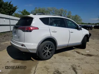 2018 Toyota RAV4 SE with VIN 2T3JFREV9JW801731, listed as a Copart auction lot 55866485 with 64,043 mi miles and Salvage title. Bid and sale history available at DreamBid. Image 3.