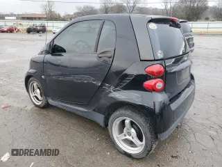 2012 Smart fortwo Pure with VIN WMEEJ3BAXCK568065, listed as a Copart auction lot 84398194 with 73,989 mi miles and Clean title. Bid and sale history available at DreamBid. Image 2.