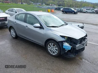 2012 Mazda 3 i Touring with VIN JM1BL1V71C1677133, listed as a IAAI auction lot 41991234 with 104,610 mi miles and . Bid and sale history available at DreamBid. Image 1.