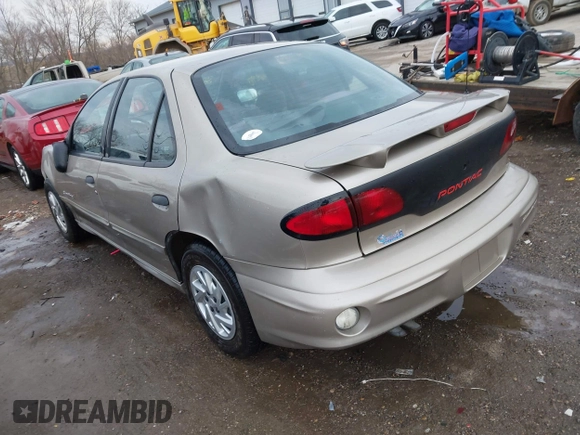 2002 Pontiac Sunfire SE z VIN 1G2JB524927104822, wystawiony jako IAAI lot #41642973 z przebiegiem 120 321 mil mil oraz . Historia ofert i sprzedaży dostępna na DreamBid. Obrazek 3.