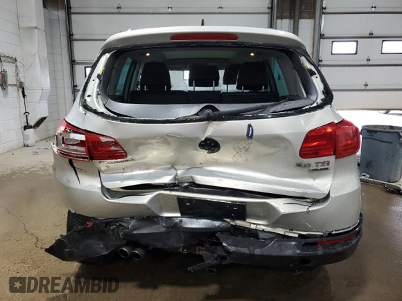 2013 Volkswagen Tiguan SE z VIN WVGBV3AX1DW579506, wystawiony jako Copart lot #52719575 z przebiegiem 163 471 mil mil oraz Szkoda całkowita • Salvage title. Historia ofert i sprzedaży dostępna na DreamBid. Obrazek 6.