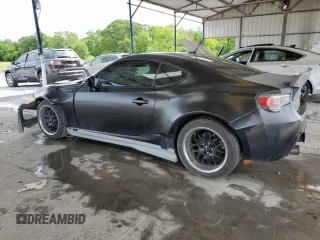 2014 Subaru BRZ Limited with VIN JF1ZCAC14E9601722, listed as a Copart auction lot 56002685 with 76,859 mi miles and Salvage title. Bid and sale history available at DreamBid. Image 2.