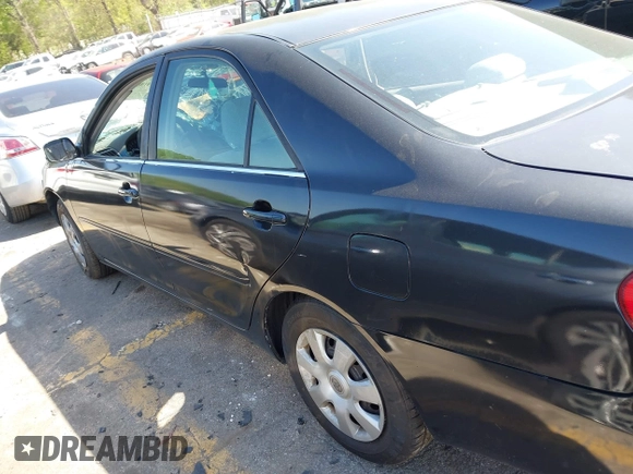 2004 Toyota Camry LE with VIN 4T1BE32K54U270040, listed as a IAAI auction lot 41984769 with Not provided miles and . Bid and sale history available at DreamBid. Image 14.