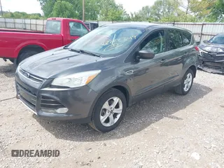 2016 Ford Escape SE with VIN 1FMCU9GXXGUC81604, listed as a IAAI auction lot 42222349 with 106,188 mi miles and . Bid and sale history available at DreamBid. Image 2.