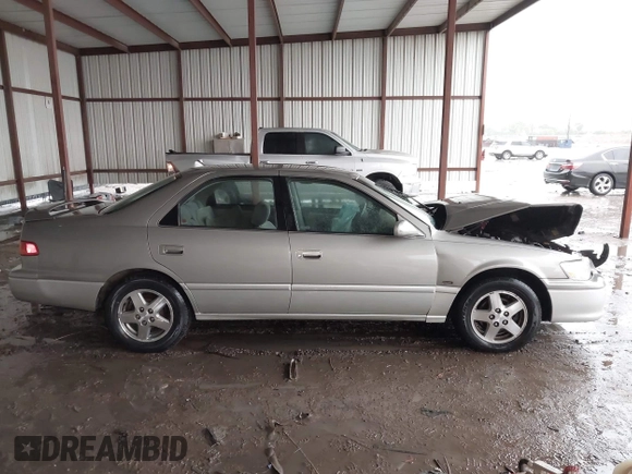 2001 Toyota Camry CE z VIN JT2BG22K410544168, wystawiony jako IAAI lot #42201412 z przebiegiem 158 500 mil mil oraz . Historia ofert i sprzedaży dostępna na DreamBid. Obrazek 13.