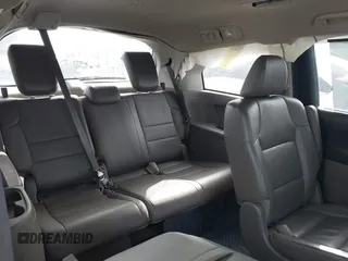 2012 Honda Odyssey EX-L with VIN 5FNRL5H60CB094682, listed as a IAAI auction lot 41570797 with 127,890 mi miles and . Bid and sale history available at carsss.com. Image 8.