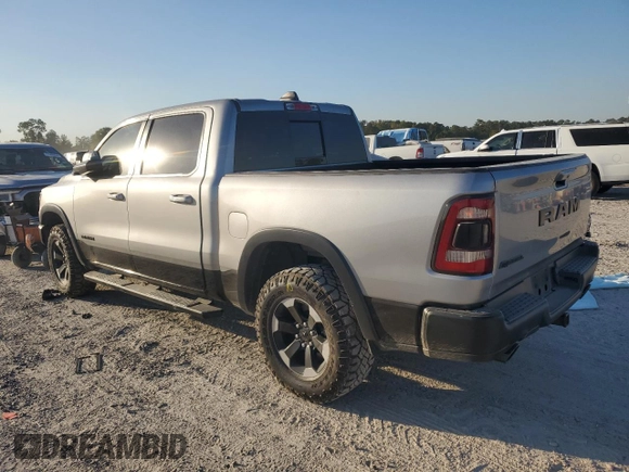 2020 Ram 1500 Rebel with VIN 1C6RRELT7LN299176, listed as a Copart auction lot 76778334 with 70,059 mi miles and Salvage title. Bid and sale history available at DreamBid. Image 2.