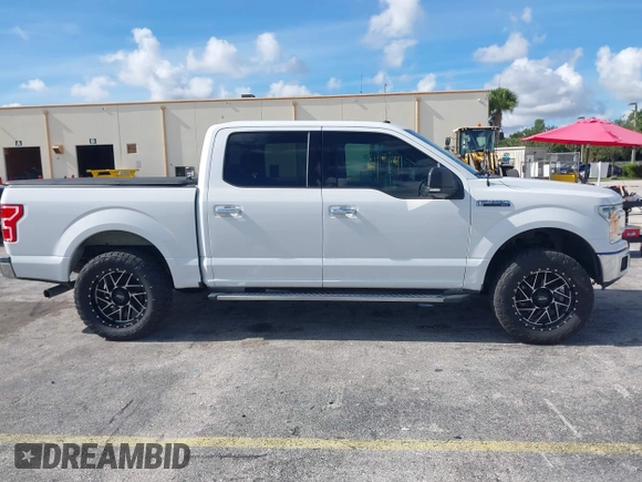 2018 Ford F-150 XL z VIN 1FTEW1CP3JFB39833, wystawiony jako IAAI lot #42798687 z przebiegiem 112 221 mil mil oraz . Historia ofert i sprzedaży dostępna na DreamBid. Obrazek 13.