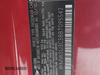 2011 MINI Hardtop z VIN WMWSU3C58BT095542, wystawiony jako Copart lot #57474055 z przebiegiem 41 490 mil mil oraz Szkoda całkowita • Salvage title. Historia ofert i sprzedaży dostępna na DreamBid. Obrazek 13.