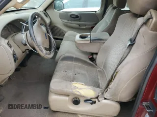 2003 Ford F-150 XL with VIN 1FTRX17L63NA96989, listed as a Copart auction lot 51501945 with 297,669 mi miles and Salvage Title. Bid and sale history available at carsss.com. Image 7.