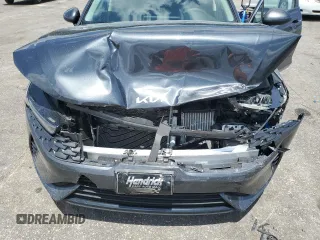 2023 Kia K5 LXS z VIN 5XXG14J21PG213387, wystawiony jako Copart lot #57720055 z przebiegiem 24 559 mil mil oraz Szkoda całkowita • Salvage title. Historia ofert i sprzedaży dostępna na DreamBid. Obrazek 11.