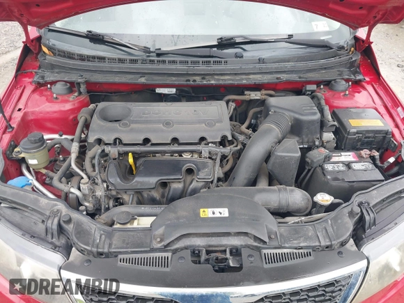 2013 Kia Forte EX with VIN KNAFU4A27D5729222, listed as a IAAI auction lot 42005687 with 124,785 mi miles. Bid and sale history available at carsss.com. Image 10.