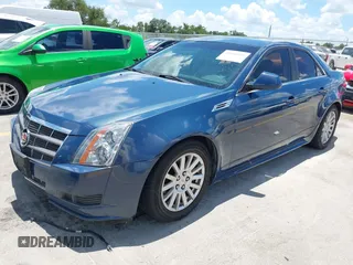 2010 Cadillac CTS Luxury with VIN 1G6DE5EG3A0115377, listed as a IAAI auction lot 42608919 with 191,657 mi miles and . Bid and sale history available at DreamBid. Image 2.